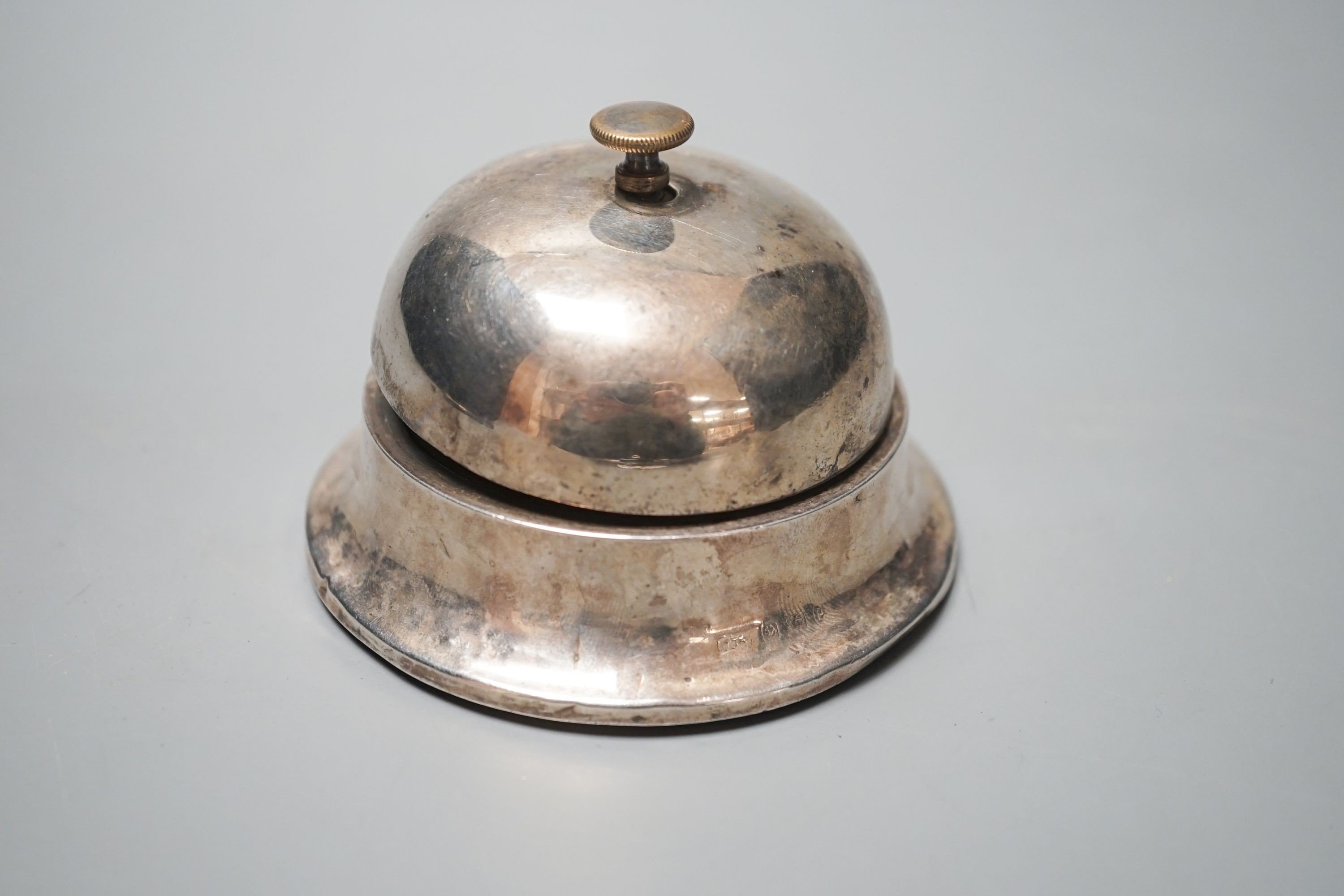 A George V silver mounted table bell, Birmingham, 1914, 88mm.